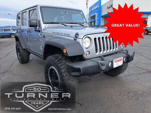 Used 2014 Jeep Wrangler Unlimited Rubicon w/ Max Tow Package image 1