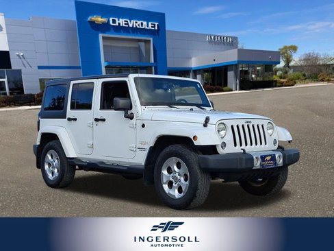 Used 2014 Jeep Wrangler Unlimited Sahara w/ Dual Top Group image 1