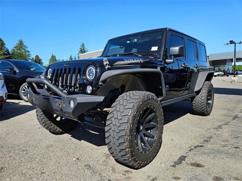 Used 2016 Jeep Wrangler Unlimited Sport image 1