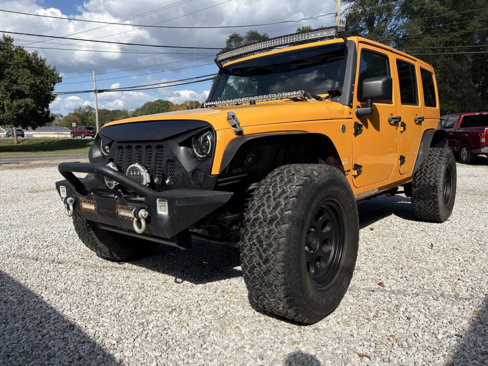 Used 2012 Jeep Wrangler Unlimited Sahara w/ Dual Top Group image 1