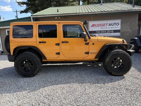 Used 2012 Jeep Wrangler Unlimited Sahara w/ Dual Top Group image 5