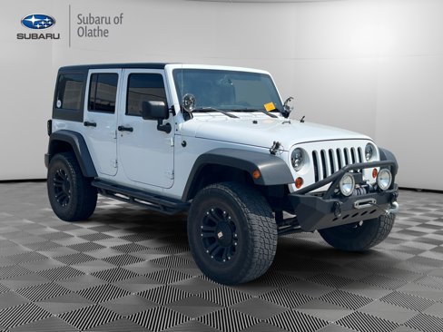 Used 2013 Jeep Wrangler Unlimited Sport image 1
