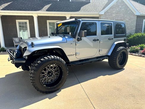 Used 2013 Jeep Wrangler Unlimited Sahara w/ Dual Top Group image 2