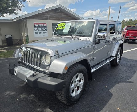Used 2014 Jeep Wrangler Unlimited Sahara w/ Dual Top Group image 1