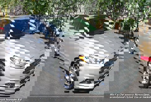 Used 2015 Ford Fusion SE image 1