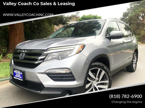 Used 2016 Honda Pilot Touring image 1
