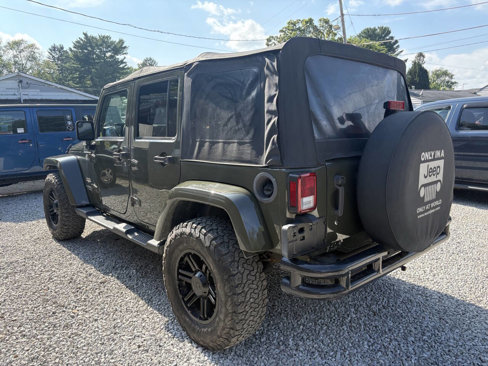 Used 2015 Jeep Wrangler Unlimited Sahara w/ Dual Top Group image 9