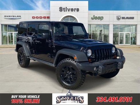 Used 2013 Jeep Wrangler Unlimited Sahara image 1