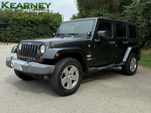 Used 2010 Jeep Wrangler Unlimited Sahara w/ Dual Top Group image 1