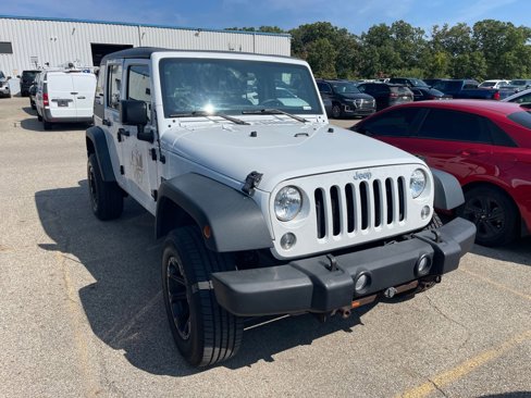 Used 2015 Jeep Wrangler Unlimited Sport image 1