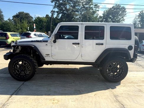 Used 2014 Jeep Wrangler Unlimited Sahara image 16