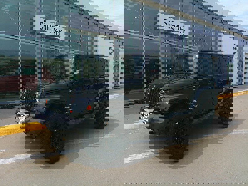 Used 2012 Jeep Wrangler Unlimited Sahara w/ Dual Top Group image 1