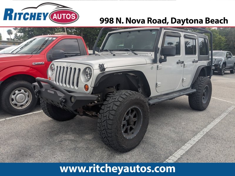 Used 2012 Jeep Wrangler Unlimited Sport image 1