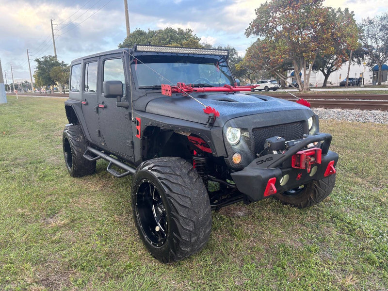 Used 2016 Jeep Wrangler Unlimited Sahara image 1