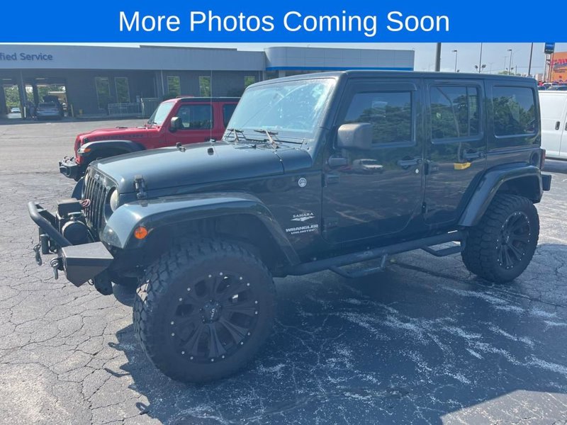 Used 2012 Jeep Wrangler Unlimited Sahara w/ Dual Top Group image 1