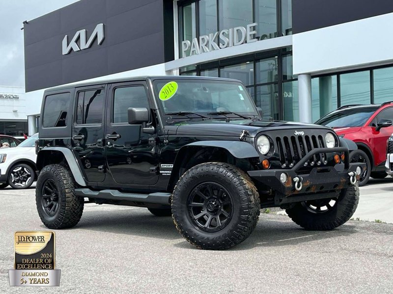 Used 2013 Jeep Wrangler Unlimited Sport image 1