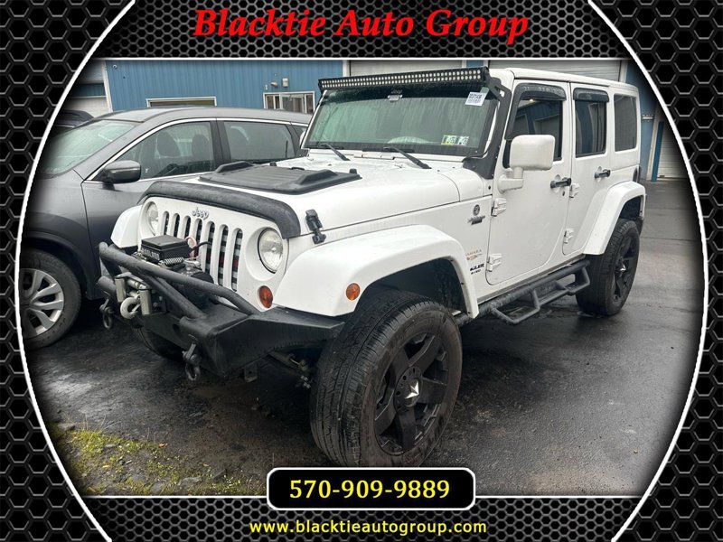 Used 2012 Jeep Wrangler Unlimited Sahara w/ Dual Top Group image 1