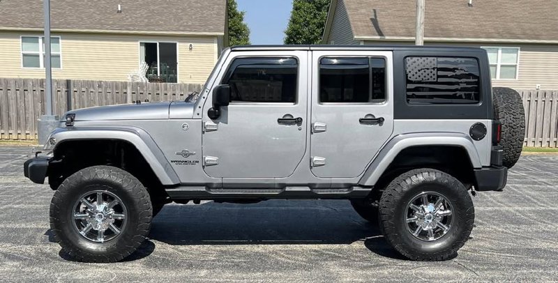 Used 2014 Jeep Wrangler Unlimited Sport image 1