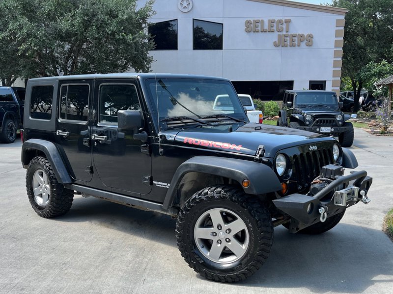 Used 2010 Jeep Wrangler Unlimited Rubicon w/ Dual Top Group image 1