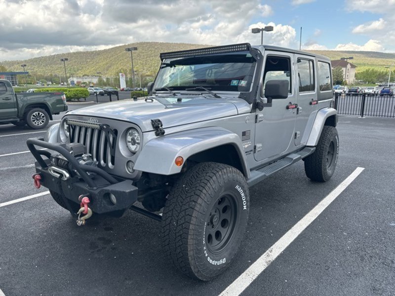 Used 2014 Jeep Wrangler Unlimited Sahara w/ Dual Top Group image 1
