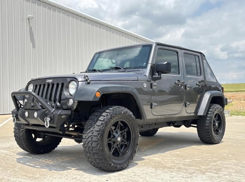 Used 2014 Jeep Wrangler Unlimited Sport image 1