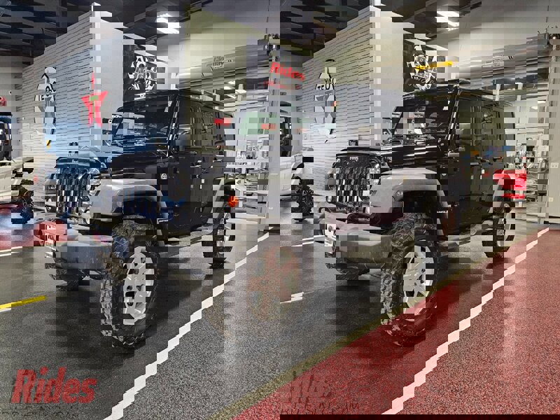 Used 2015 Jeep Wrangler Unlimited Sport image 1